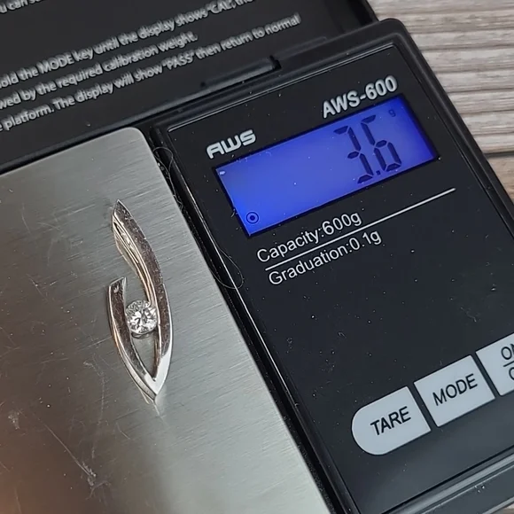 14KT WHITE GOLD TENSION SET DIAMOND PENDANT - Picture 13 of 13